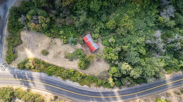 a view of a garden with a fountain