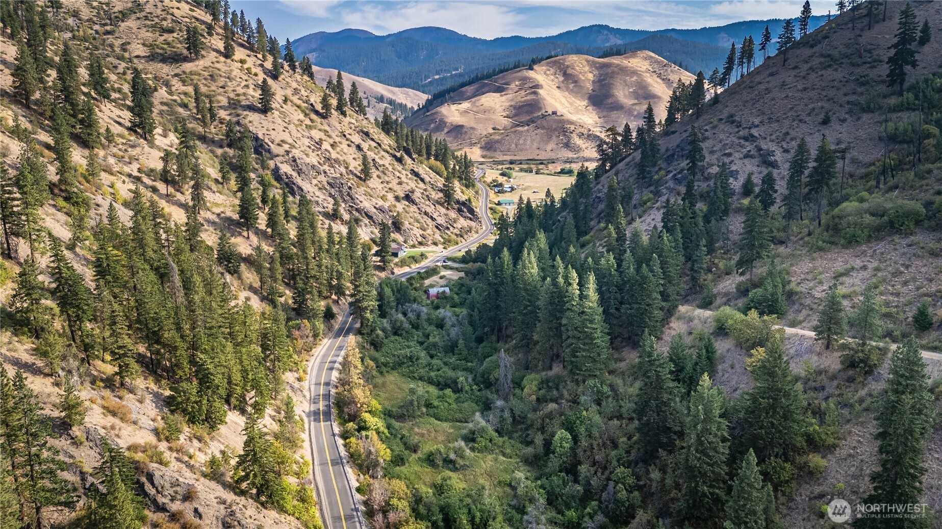 8979 Olalla Canyon Road Cashmere, WA 98815 - Photo 18 of 18 a view of a dry yard with trees