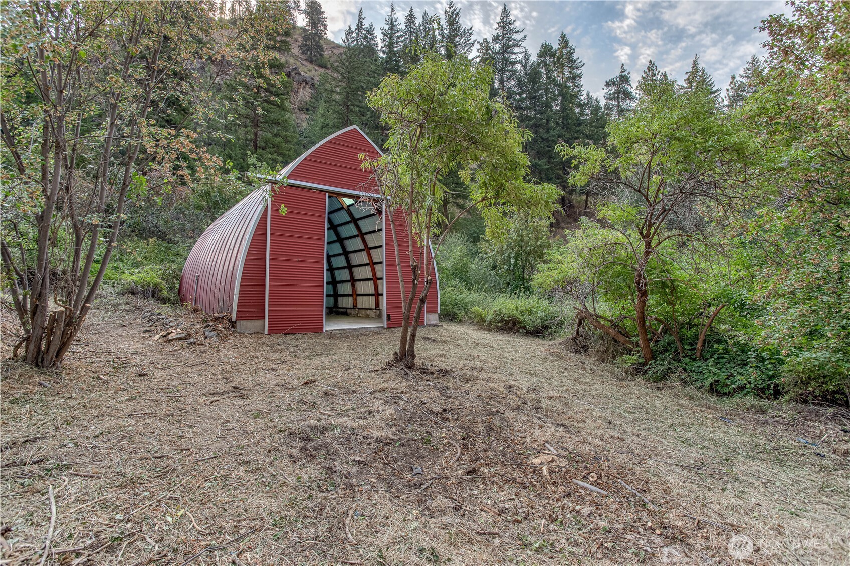 8979 Olalla Canyon Road Cashmere, WA 98815 - Photo 2 of 18 a view of a backyard