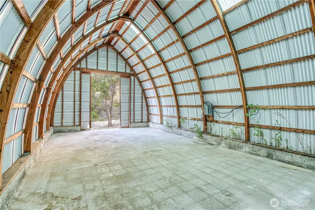 a view of an empty room with a balcony
