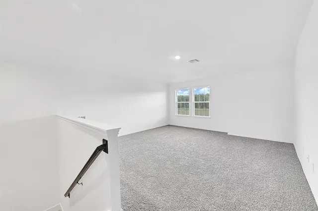 an empty room with an entryway