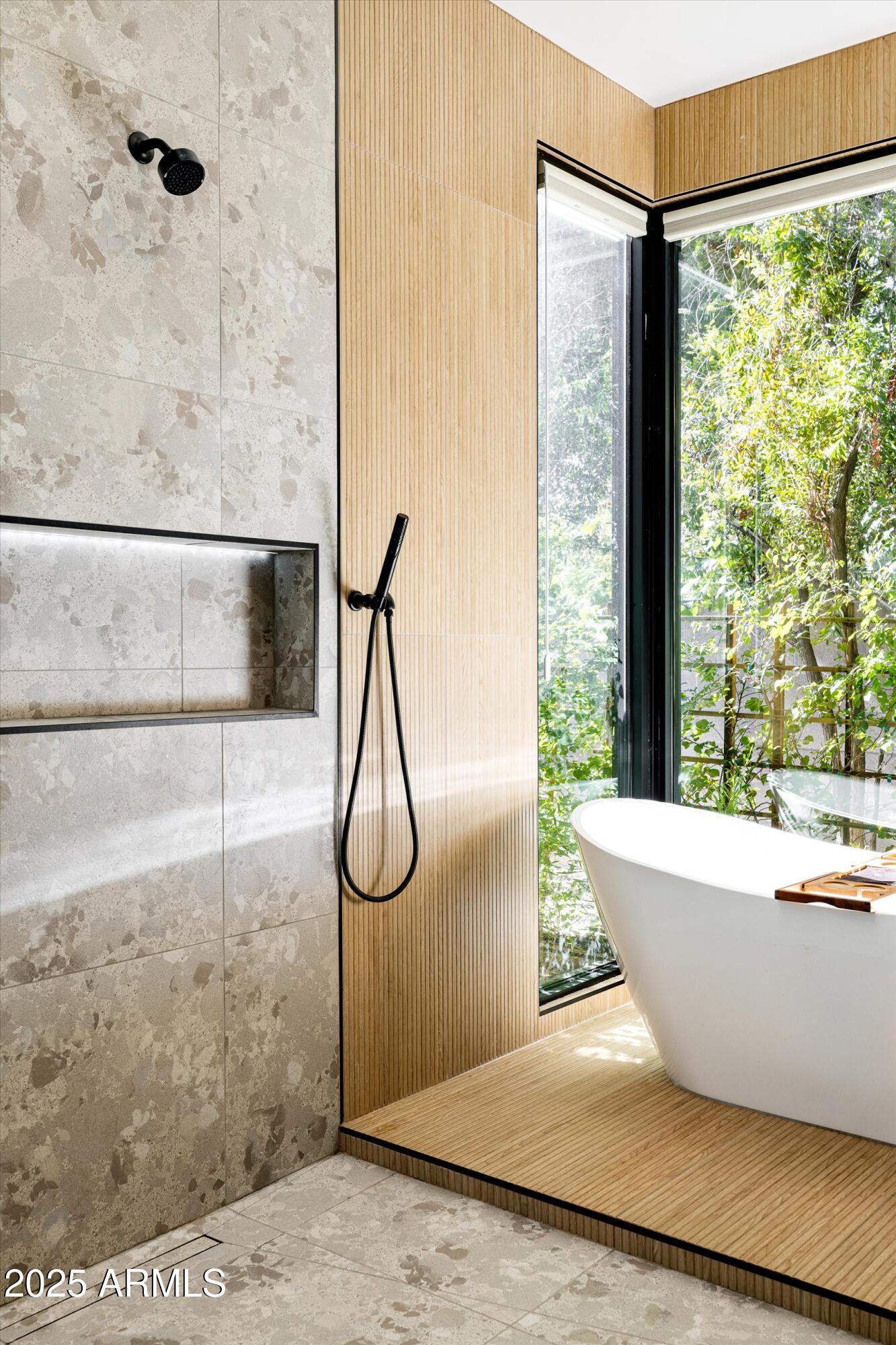 3721 East Piccadilly Road Phoenix, AZ 85018 - Photo 27 of 54 a view of a bathtub in a bathroom
