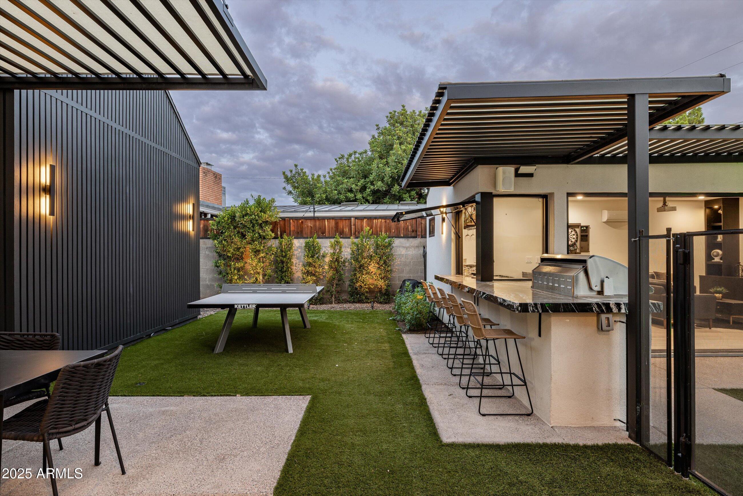 3721 East Piccadilly Road Phoenix, AZ 85018 - Photo 51 of 54 a view of outdoor dining space with a patio