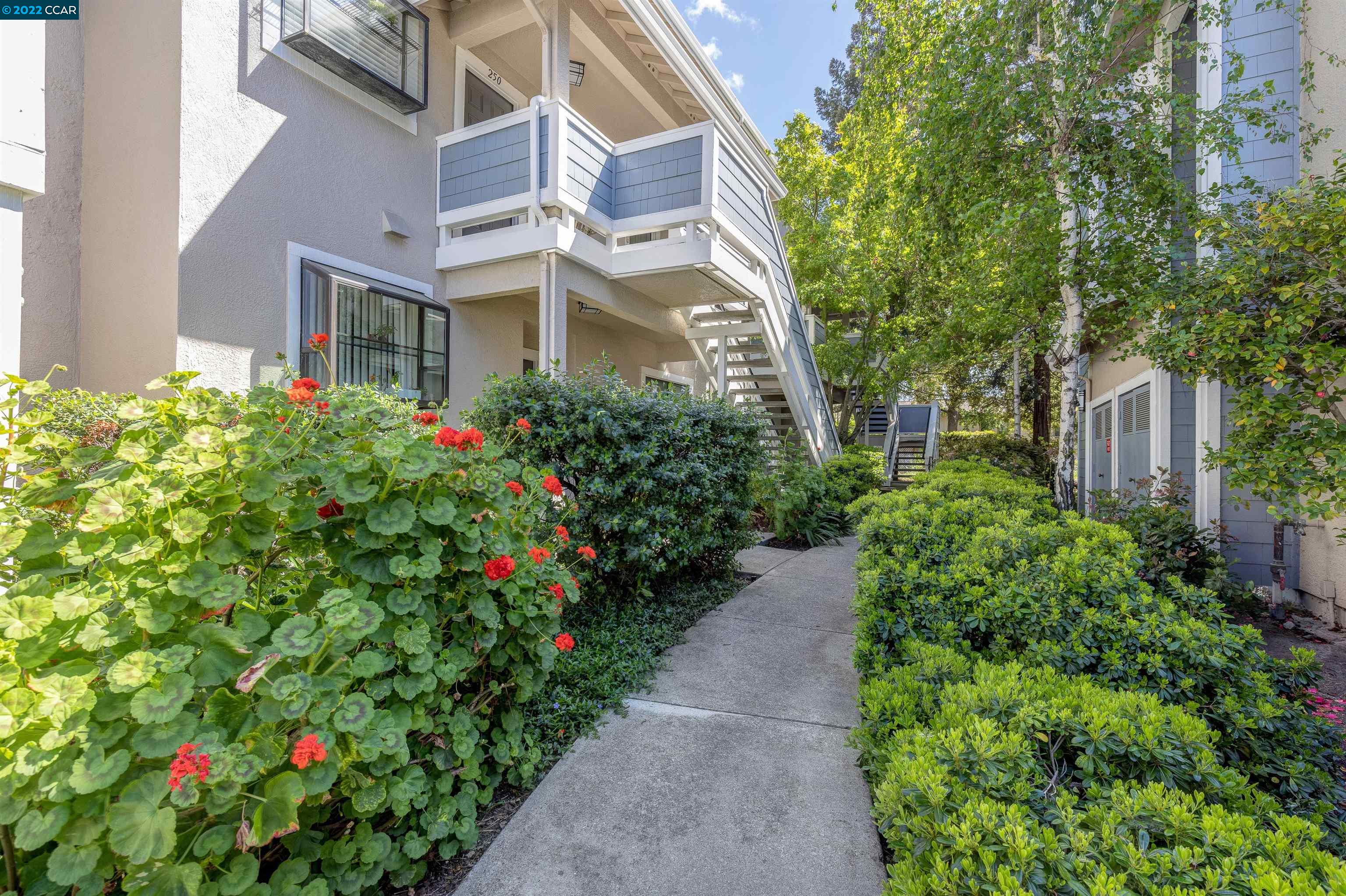 2685 Oak Road, Unit 254 Walnut Creek, CA 94597 - Photo 1 of 1 a front view of a multi story residential apartment building