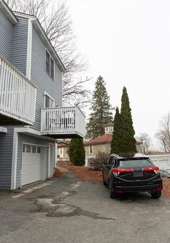 a car parked in front of a house
