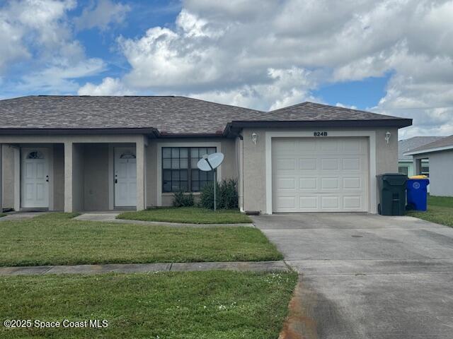 824 Faull Drive, Unit B Rockledge, FL 32955 - Photo 2 of 12 a front view of a house with a yard