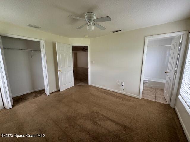 824 Faull Drive, Unit B Rockledge, FL 32955 - Photo 6 of 12 an empty room with closet and a ceiling fan