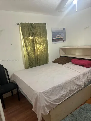 a bathroom with a toilet a sink and a bathtub