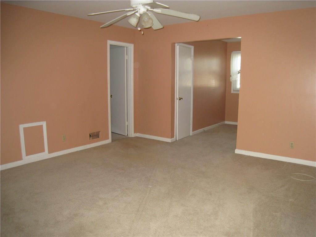 3268 Henderson Mill Road, Unit C Atlanta, GA 30341 - Photo 2 of 3 an empty room with a bathroom