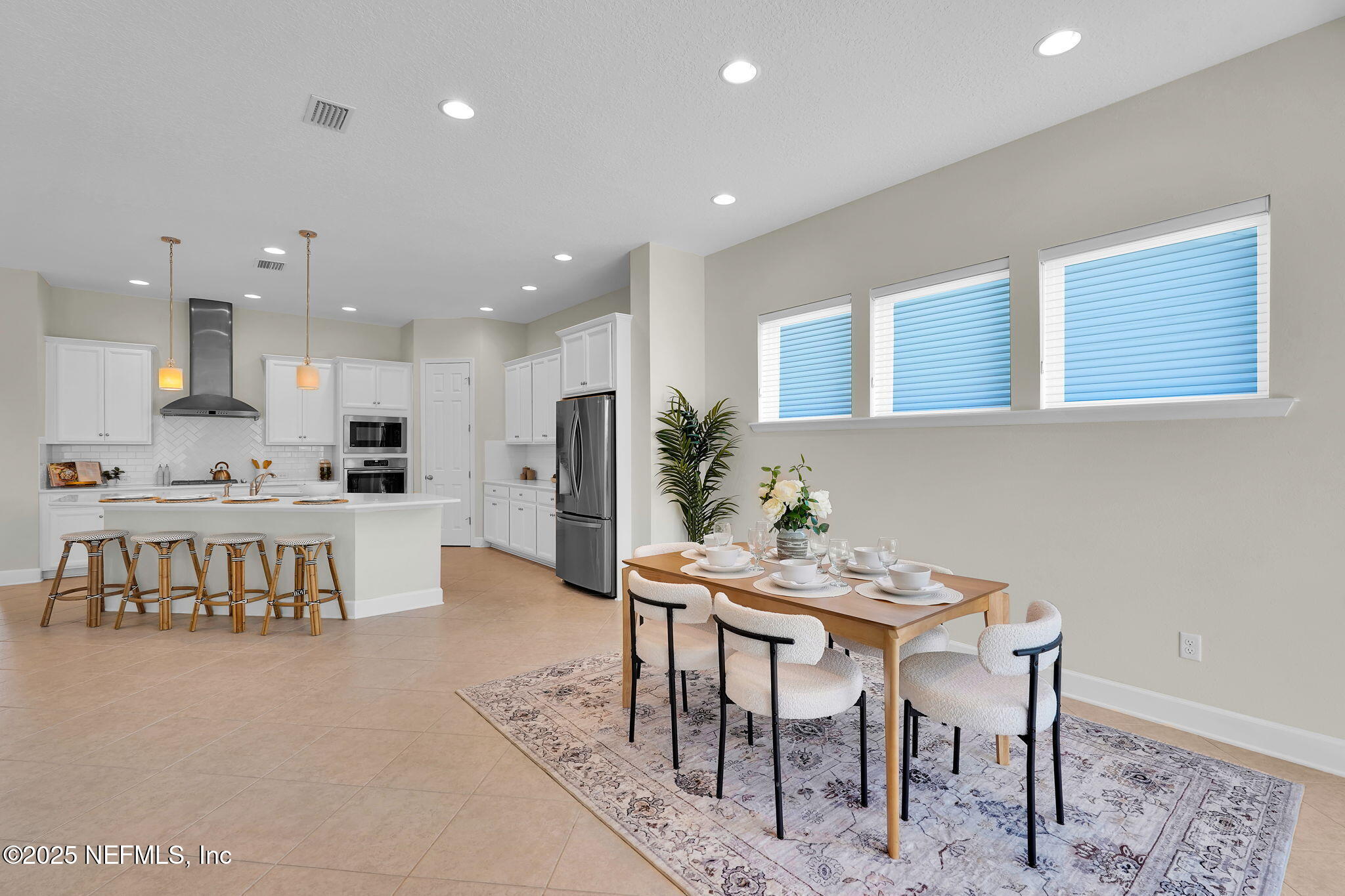 259 Daniel Park Circle Ponte Vedra, FL 32081 - Photo 10 of 69 a view of kitchen with kitchen island and stainless steel appliances