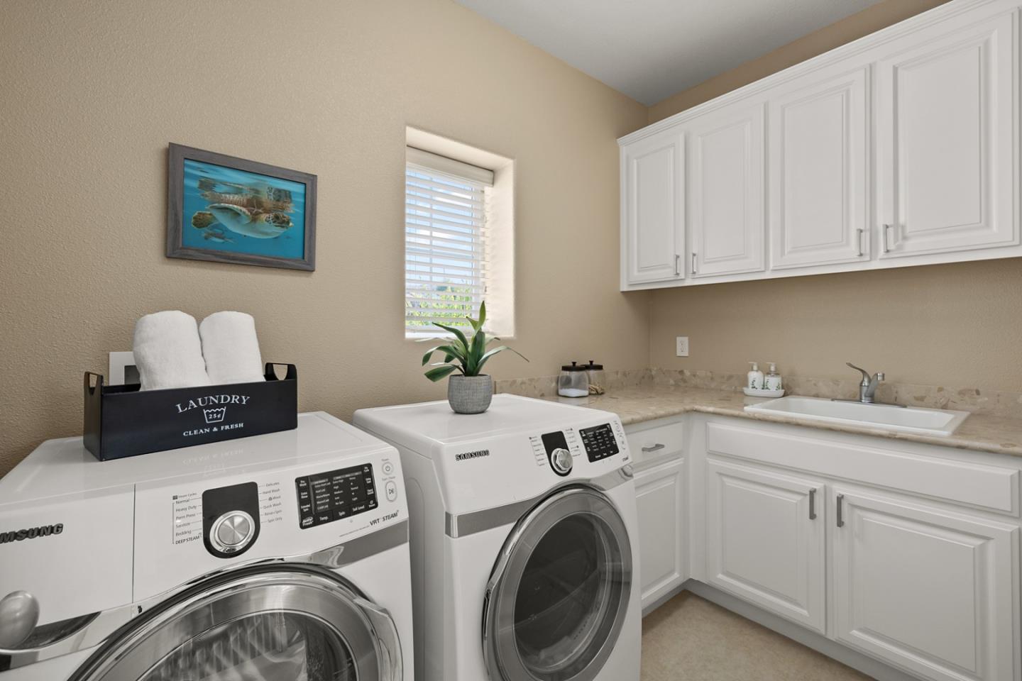 39 Estates Drive Millbrae, CA 94030 - Photo 11 of 19 a utility room with sink dryer and washer
