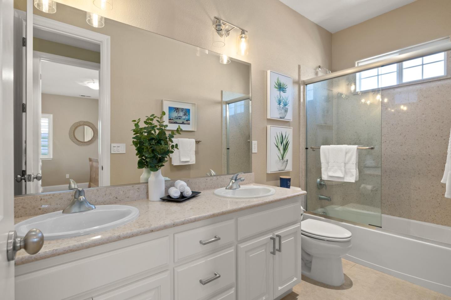 39 Estates Drive Millbrae, CA 94030 - Photo 14 of 19 a bathroom with a granite countertop sink toilet a large mirror a shower and a bathtub