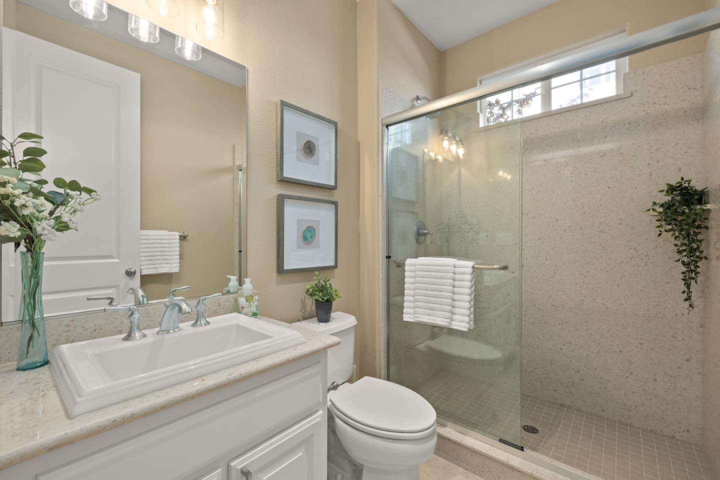 39 Estates Drive Millbrae, CA 94030 - Photo 9 of 19 a bathroom with a sink a toilet and shower