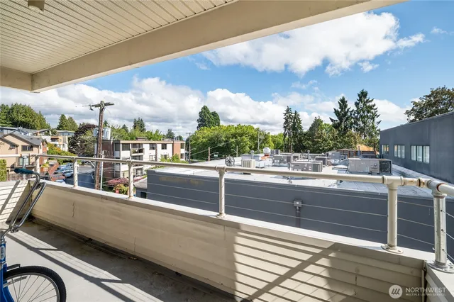 a view of a room with a large window