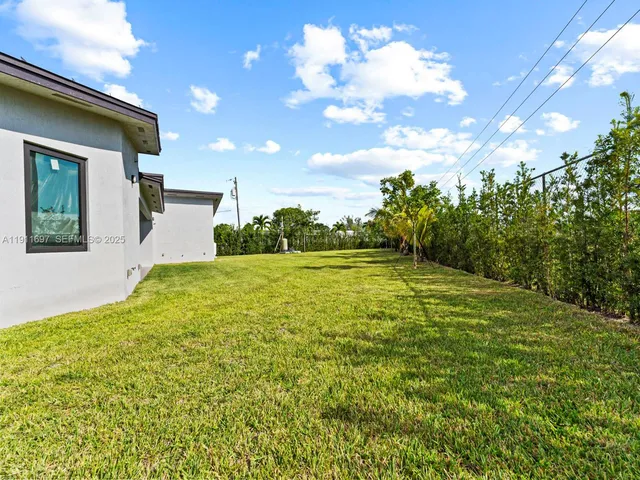 a house view with a garden space
