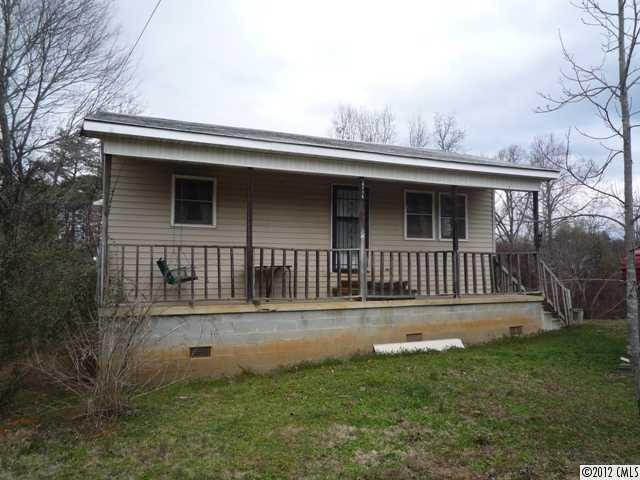 1263 Daniel Road York, SC 29745 - Photo 1 of 3 a front view of a house with a yard
