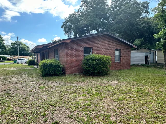 a house view with a garden space