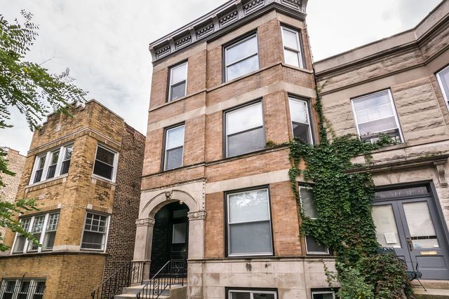 a front view of a multi story residential apartment building