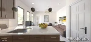 a view of a living room and dining room