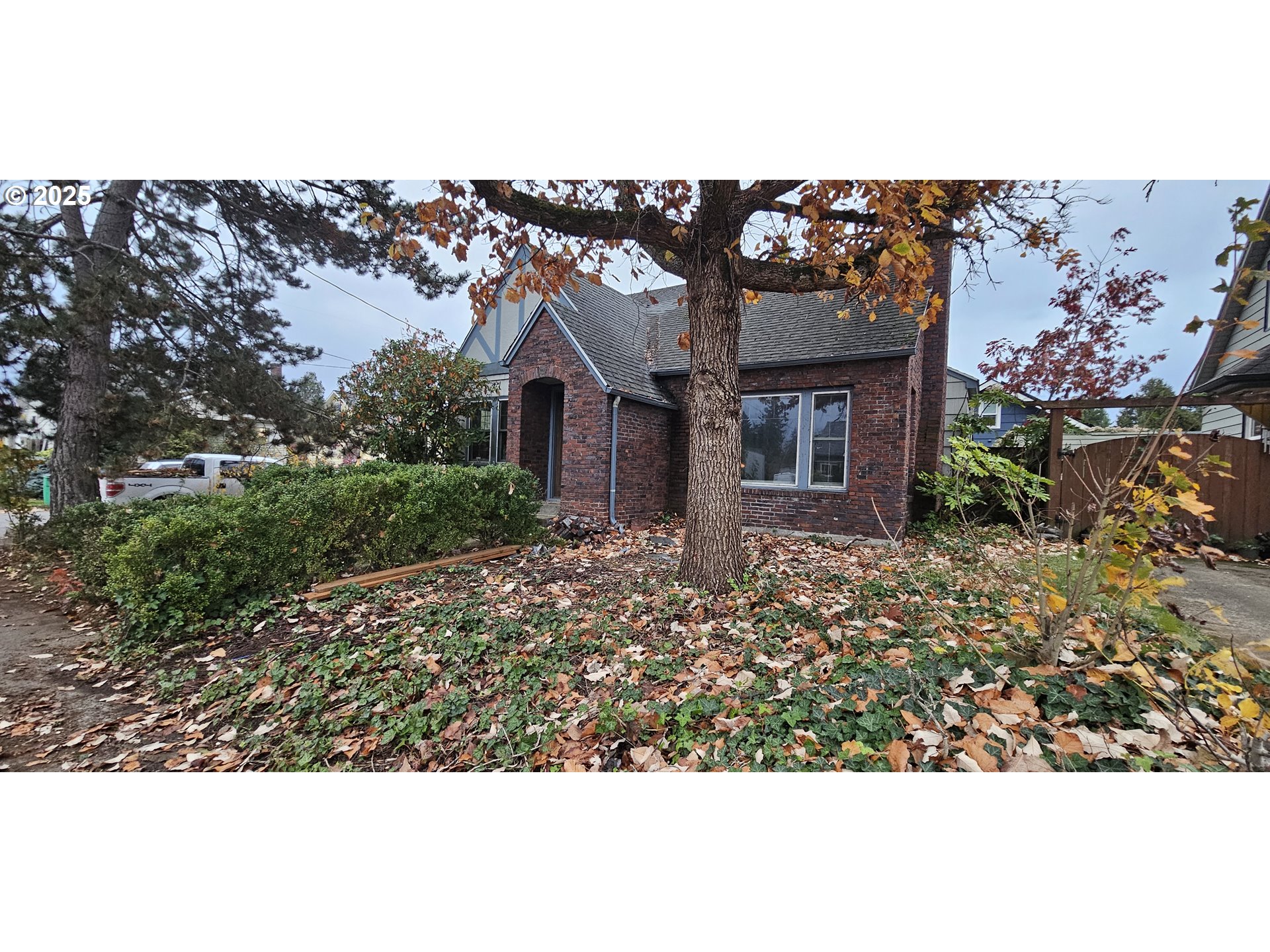 5836 Northeast Halsey Street Portland, OR 97213 - Photo 1 of 12 a view of a house with a garden