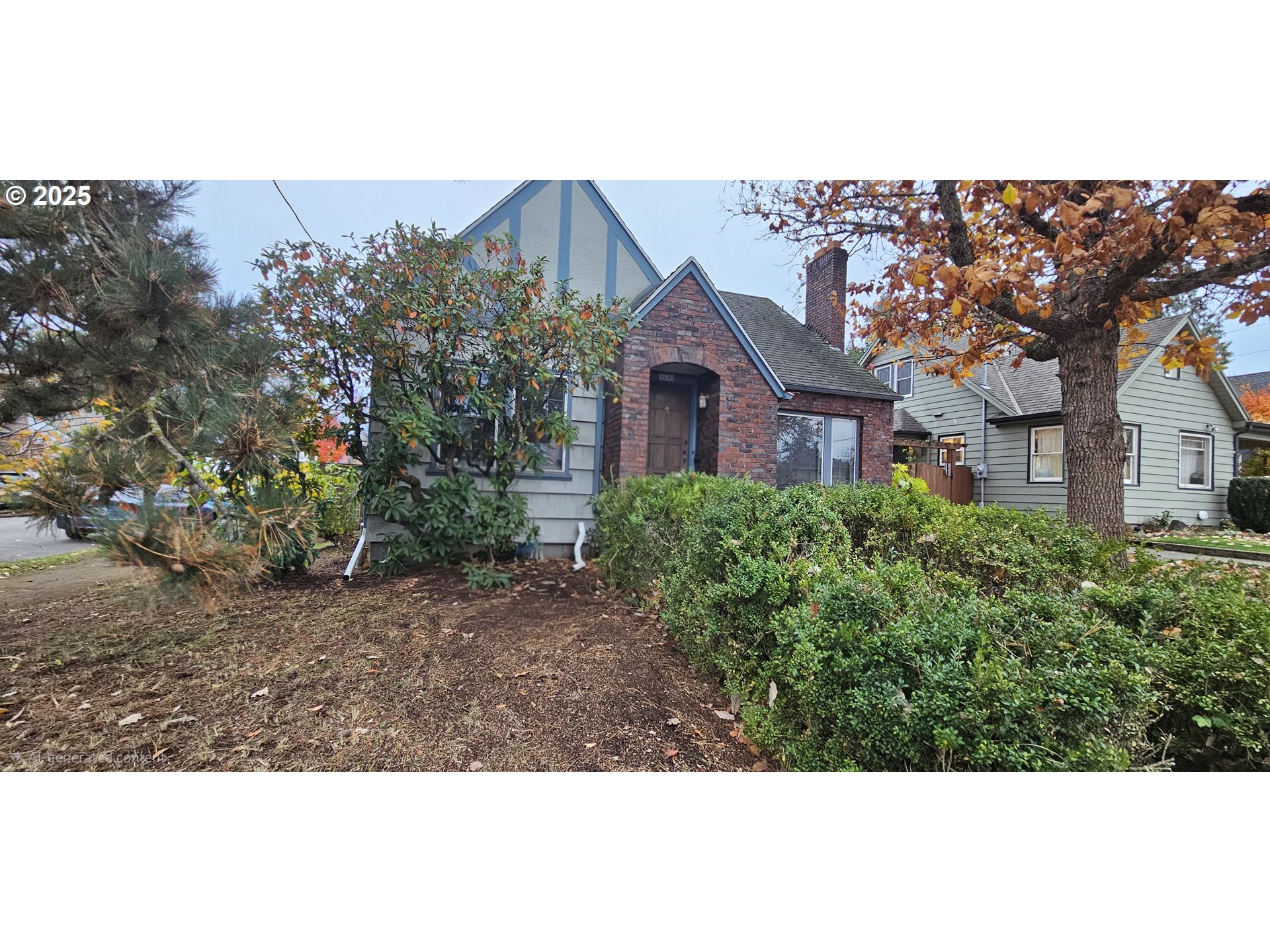 5836 Northeast Halsey Street Portland, OR 97213 - Photo 2 of 12 a view of a big yard in front of a house