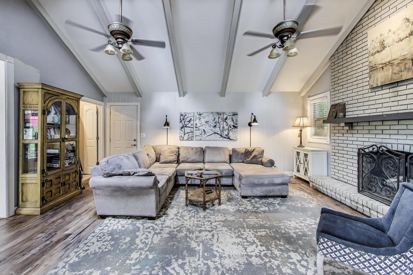 28W409 Leverenz Road Naperville, IL 60564 - Photo 14 of 39 a living room with furniture and a fireplace