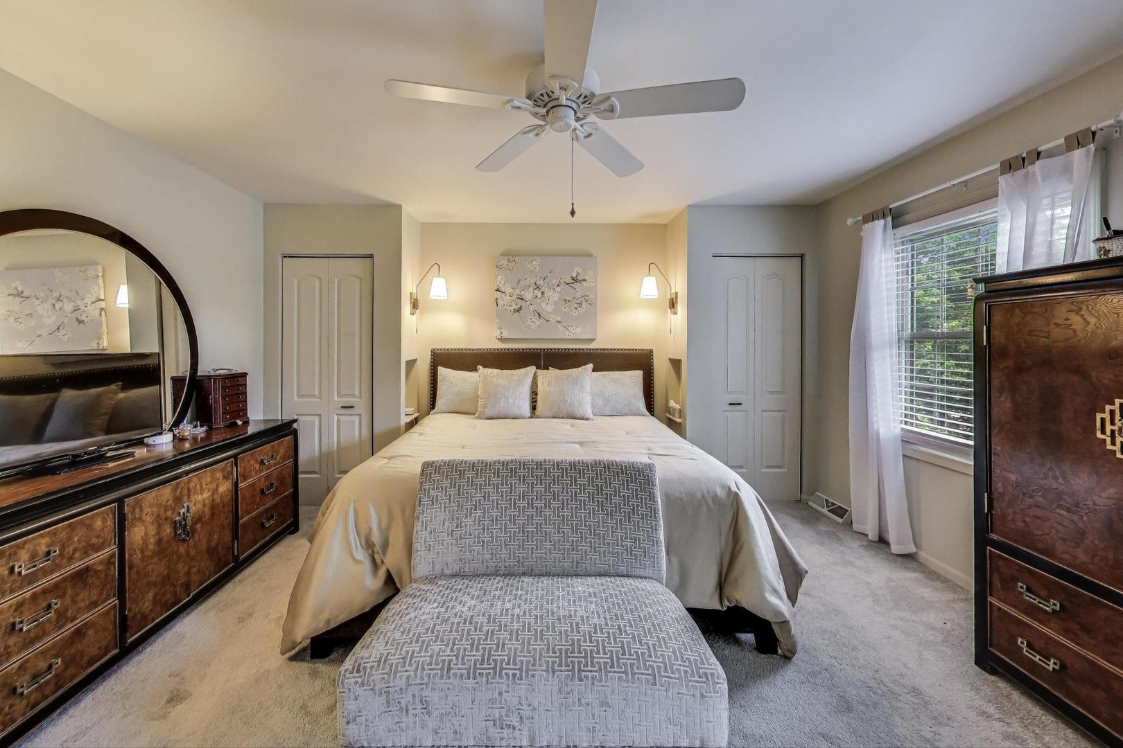 28W409 Leverenz Road Naperville, IL 60564 - Photo 22 of 39 a bedroom with a bed and a flat tv screen on dresser