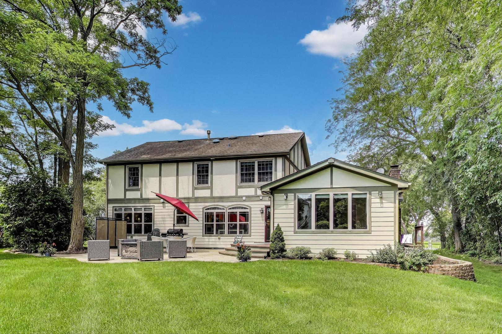 28W409 Leverenz Road Naperville, IL 60564 - Photo 29 of 39 a front view of house with yard and green space
