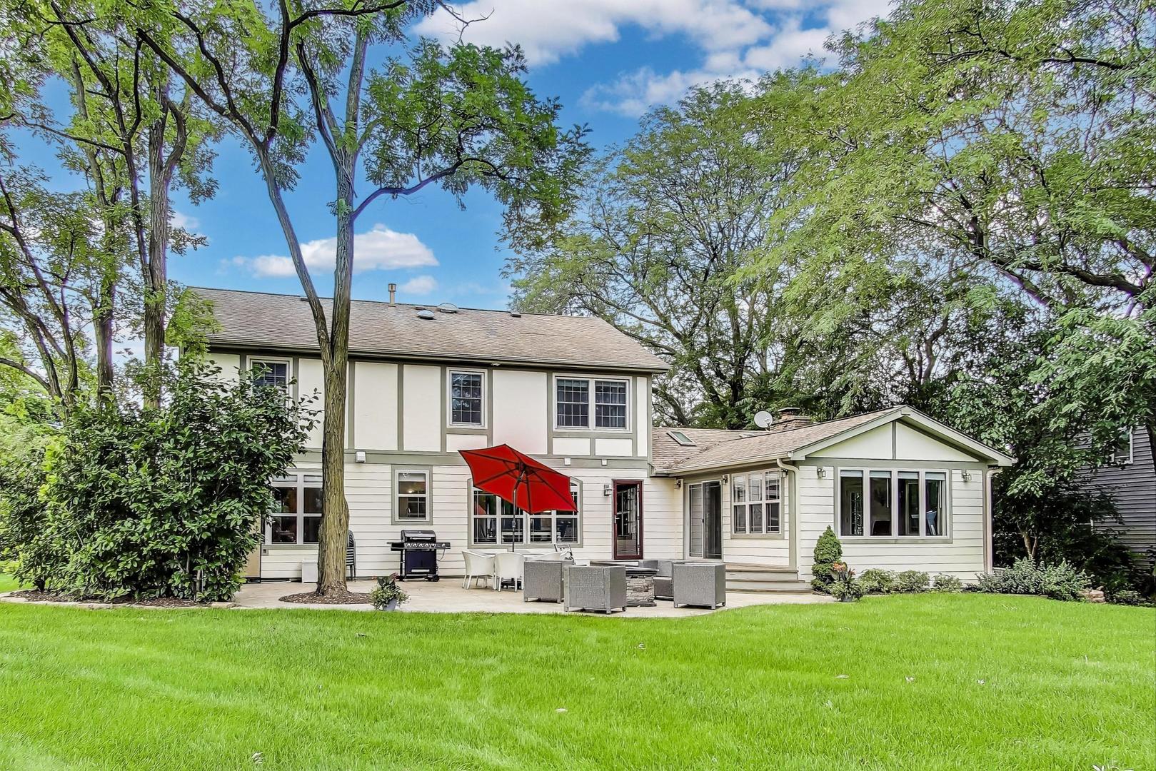 28W409 Leverenz Road Naperville, IL 60564 - Photo 30 of 39 a front view of house with yard and green space