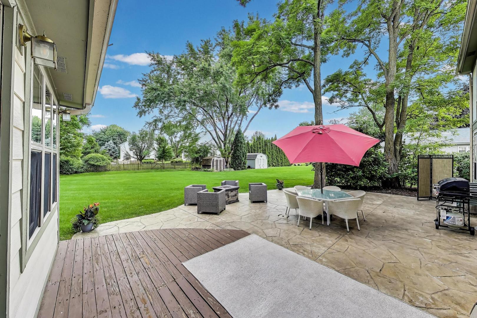 28W409 Leverenz Road Naperville, IL 60564 - Photo 31 of 39 a view of a house with backyard sitting area and garden