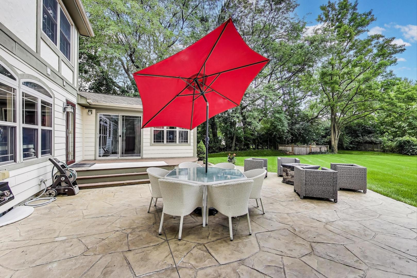 28W409 Leverenz Road Naperville, IL 60564 - Photo 33 of 39 a view of a house with backyard sitting area and garden