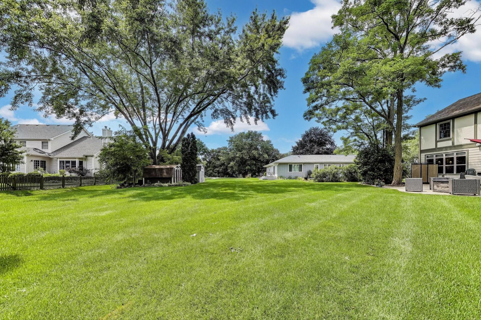 28W409 Leverenz Road Naperville, IL 60564 - Photo 36 of 39 a view of house with garden space and trees
