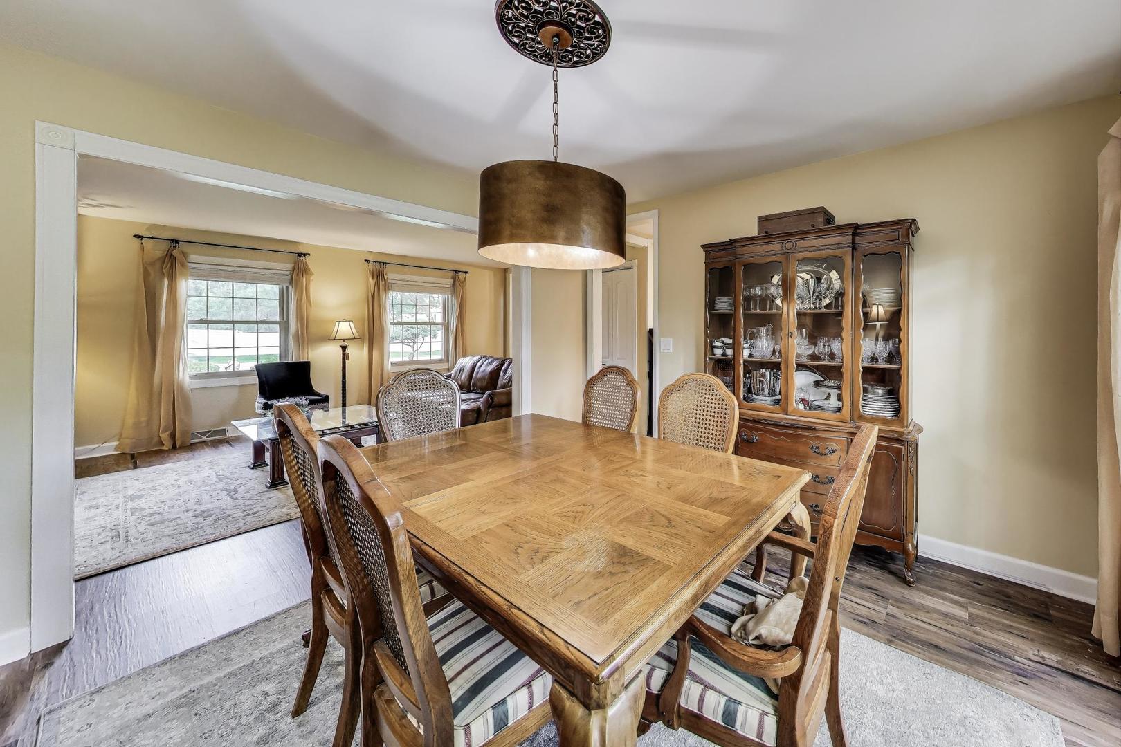 28W409 Leverenz Road Naperville, IL 60564 - Photo 8 of 39 a dining room with furniture and window