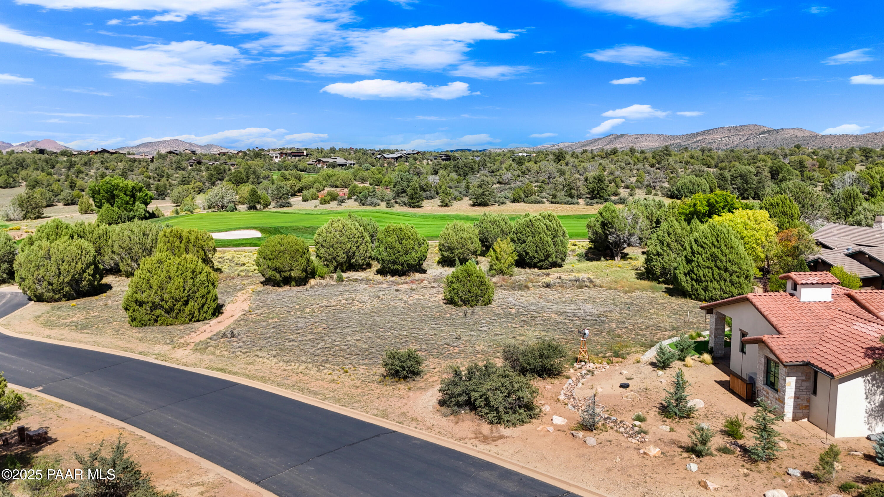 15485 North Talking Rock Ranch Road Prescott, AZ 86305 - Photo 2 of 33 a view of a street with a houses