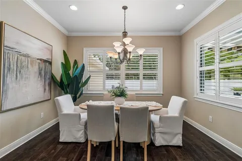 a kitchen with stainless steel appliances a stove microwave and cabinets