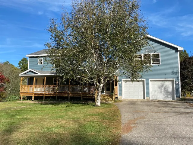a big room with table and chairs