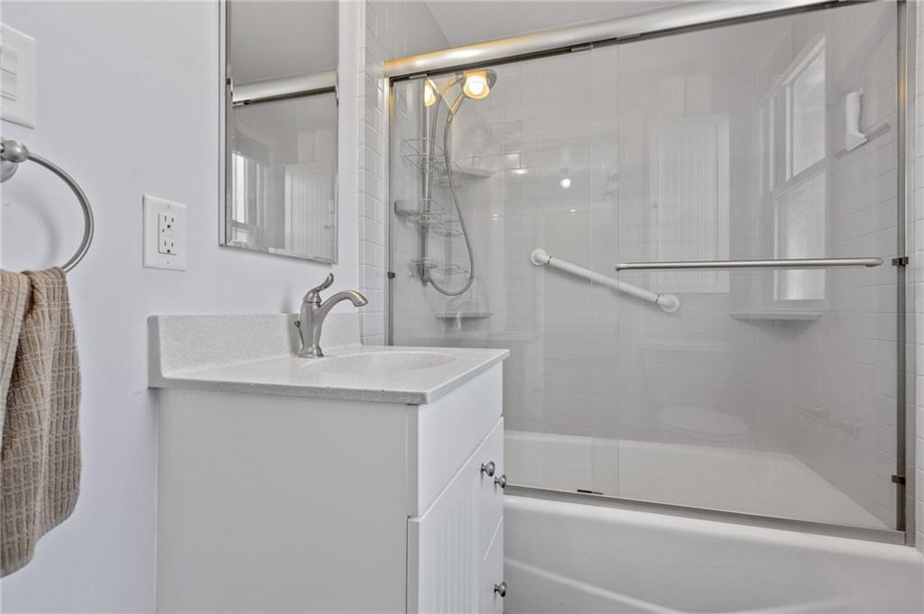 16 Ellen Drive McKees Rocks, PA 15136 - Photo 12 of 14 a bathroom with a shower and a sink
