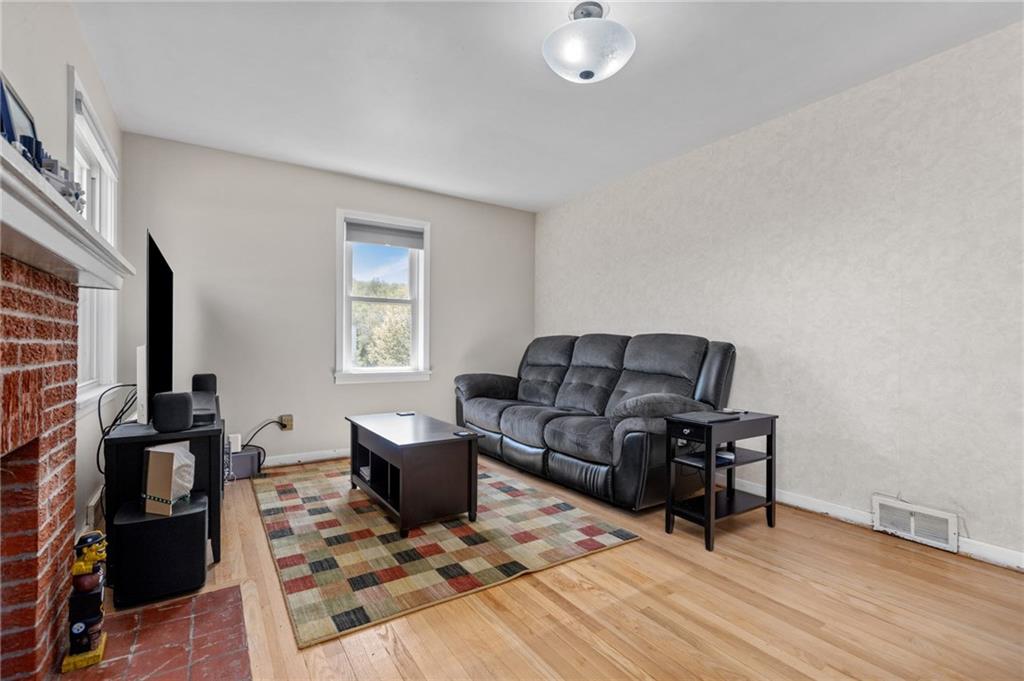 16 Ellen Drive McKees Rocks, PA 15136 - Photo 3 of 14 a living room with furniture and a window