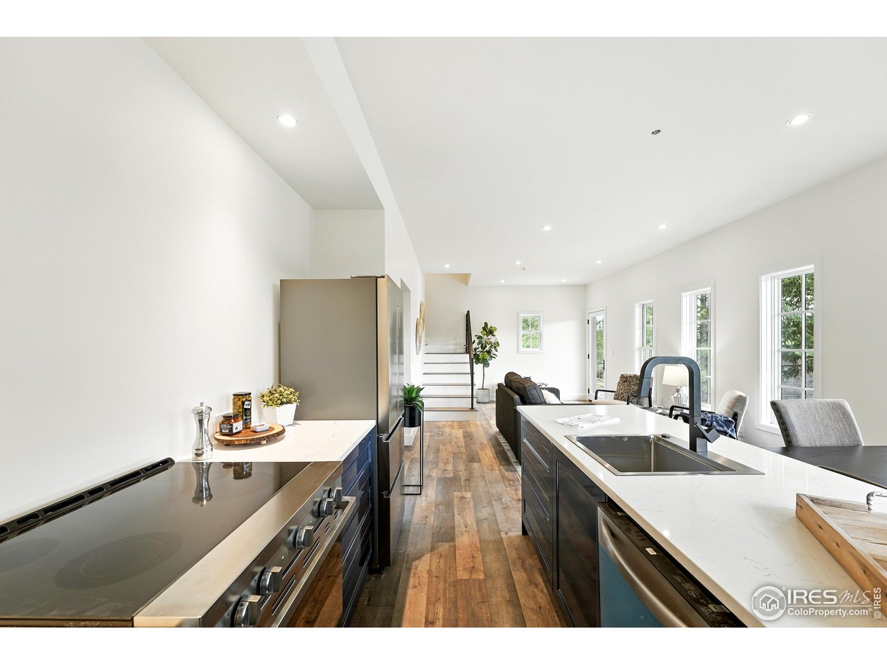 360 Boulder Street Boulder, CO 80302 - Photo 14 of 37 a kitchen with a sink and a refrigerator