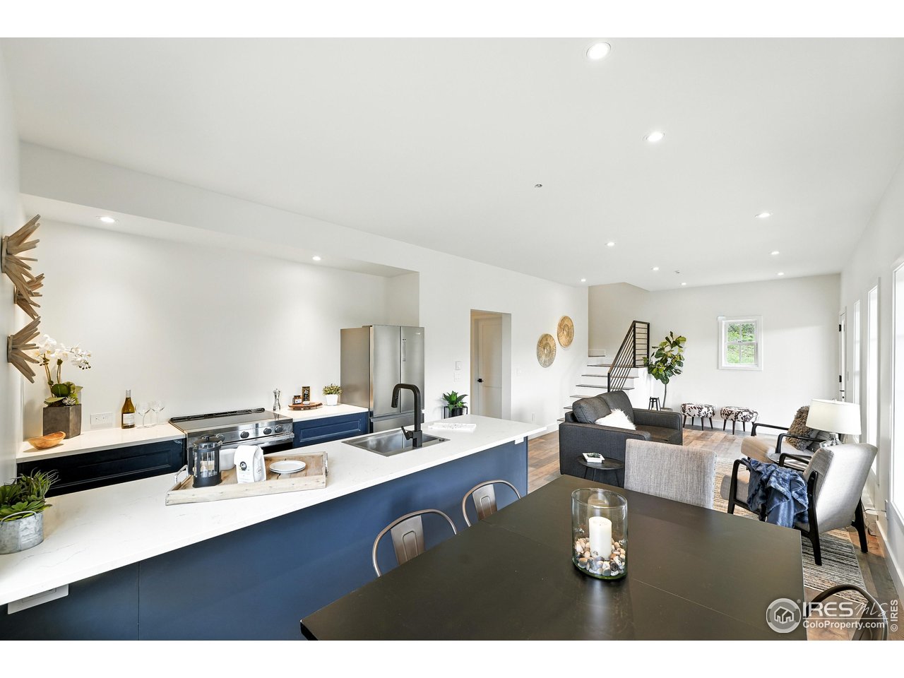 360 Boulder Street Boulder, CO 80302 - Photo 18 of 37 a living room with lots of furniture and view kitchen