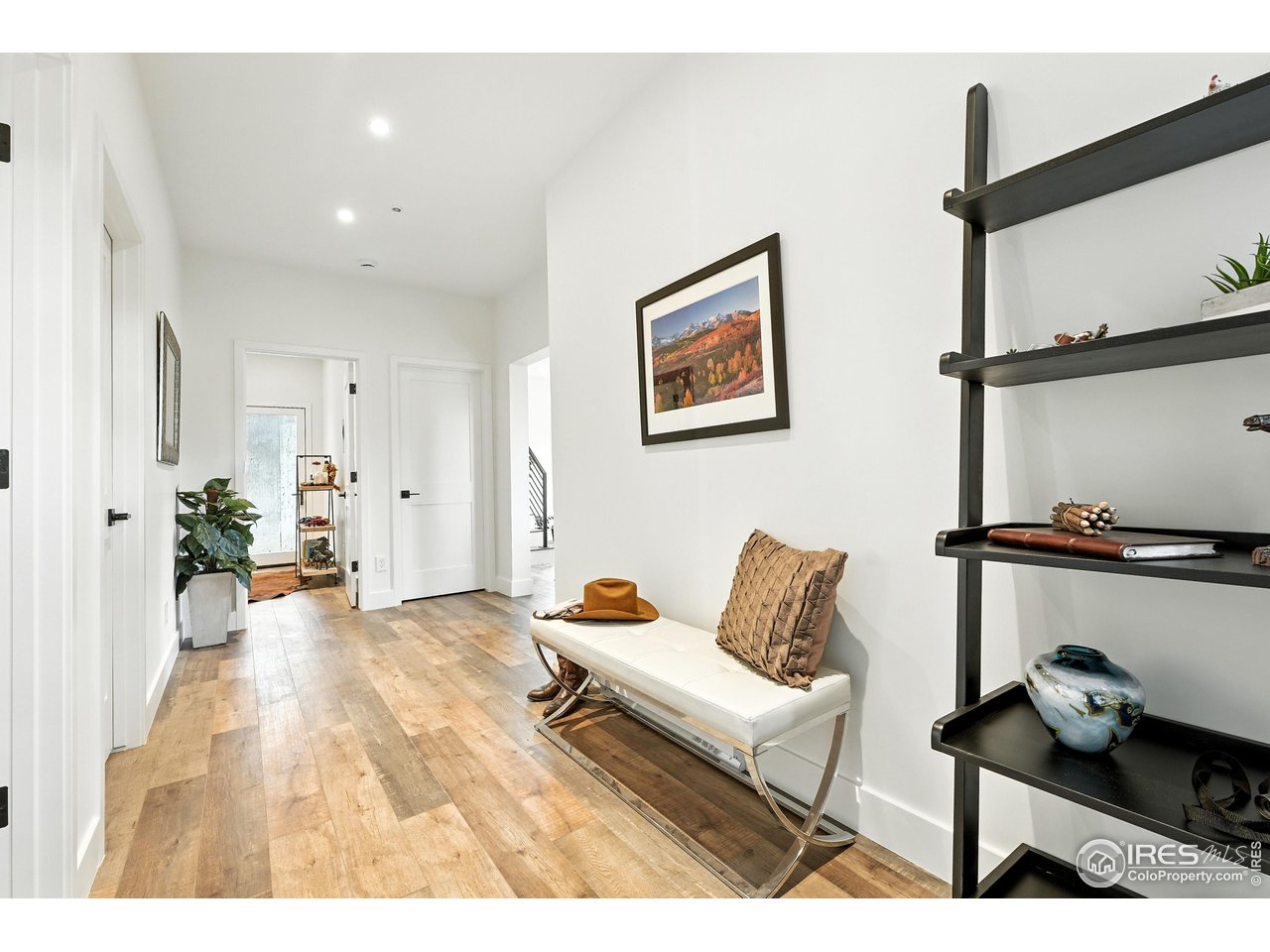 360 Boulder Street Boulder, CO 80302 - Photo 20 of 37 a living room with furniture and a wooden floor