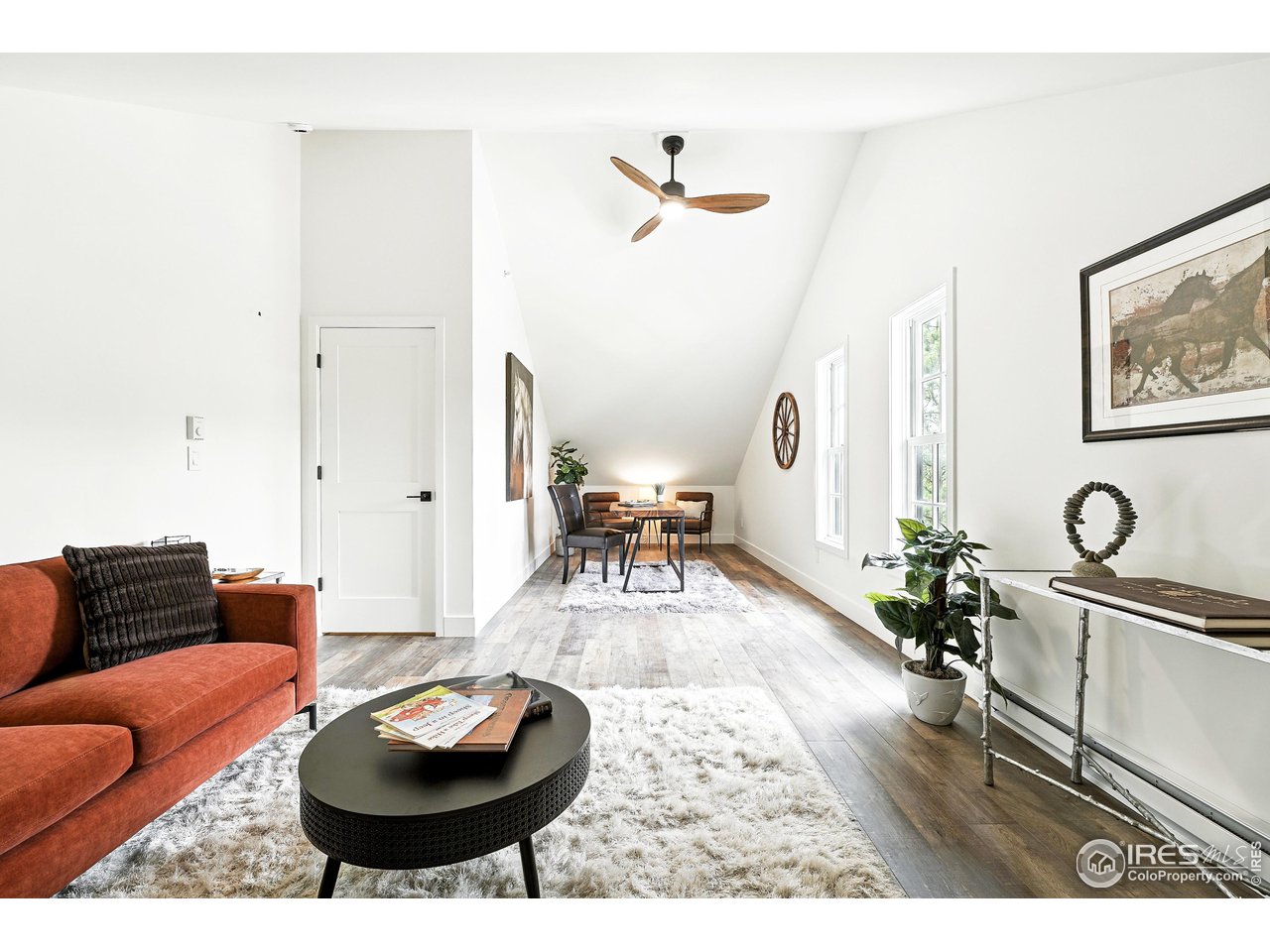 360 Boulder Street Boulder, CO 80302 - Photo 31 of 37 a living room with furniture and wooden floor