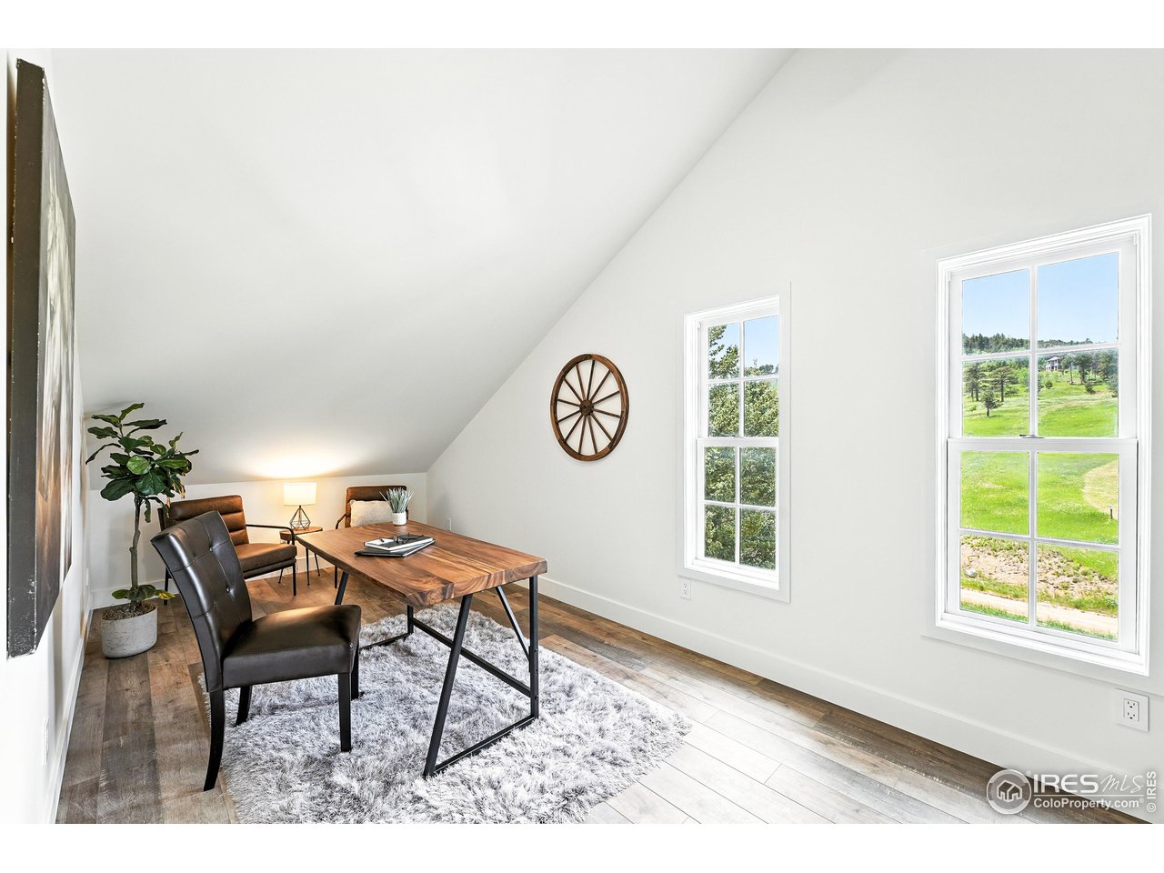 360 Boulder Street Boulder, CO 80302 - Photo 32 of 37 a living room with a table and a window