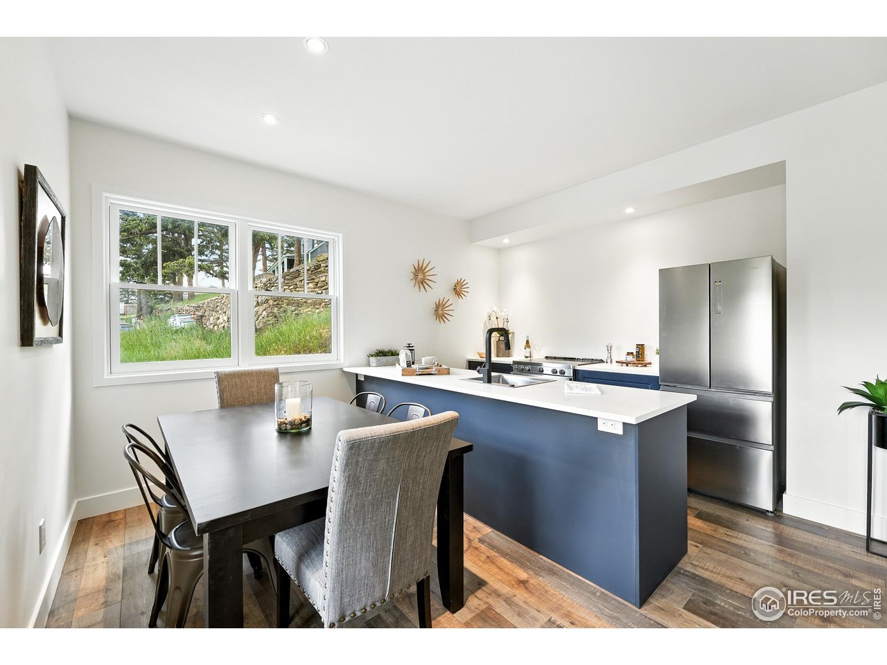 360 Boulder Street Boulder, CO 80302 - Photo 5 of 37 a view of kitchen with cabinets table and chairs