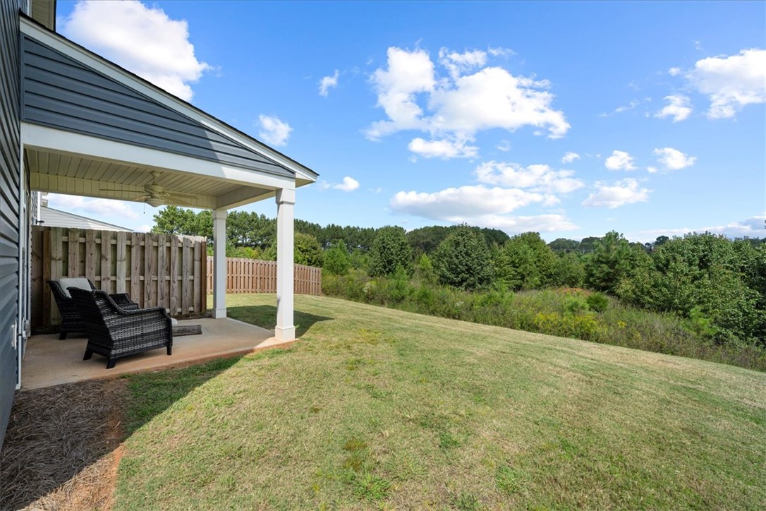 117 Adger Road Pendleton, SC 29670 - Photo 31 of 36 This inviting patio offers a tranquil retreat with ample outdoor space and lush natural surroundings.
