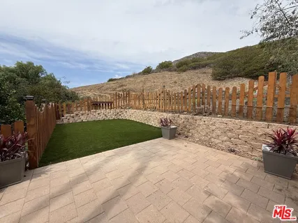 a view of a yard with an trees