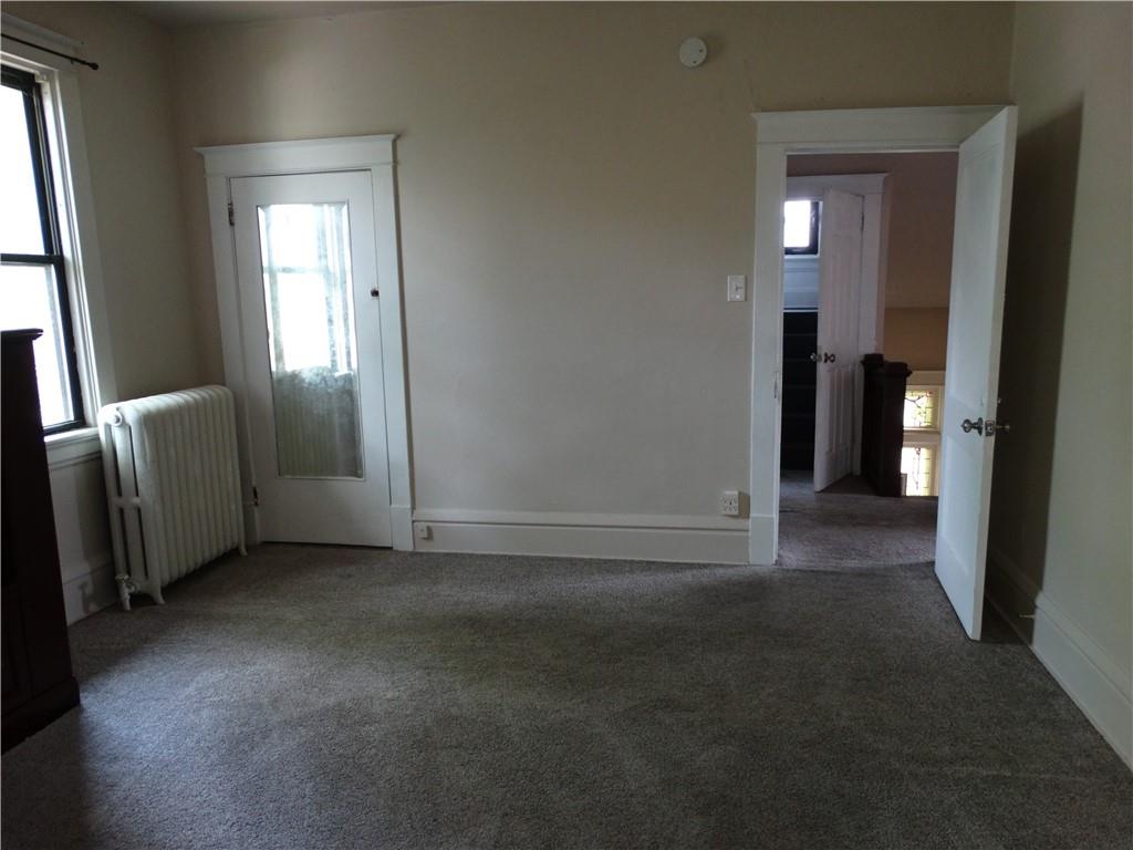 511 Chestnut Street Carnegie, PA 15106 - Photo 17 of 24 an empty room with closet and windows