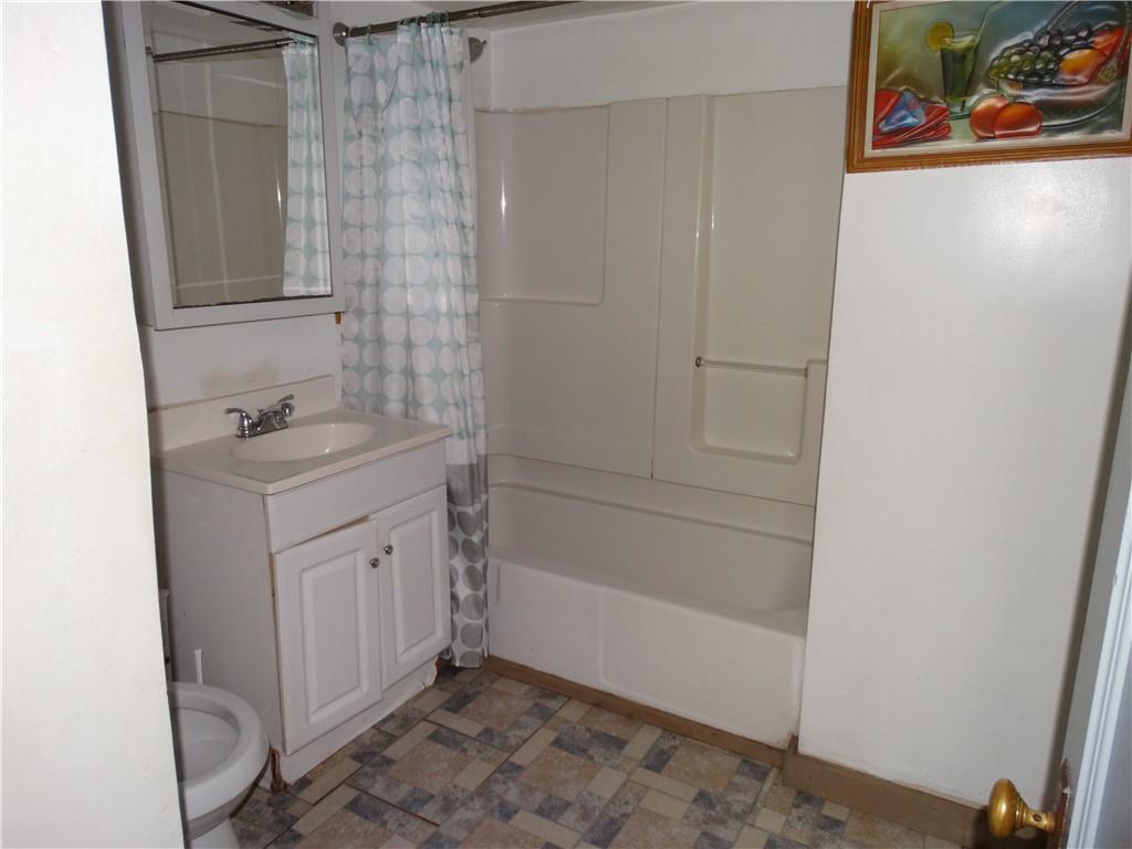 511 Chestnut Street Carnegie, PA 15106 - Photo 10 of 24 a bathroom with a sink and a mirror
