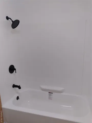 a view of a kitchen from the hallway