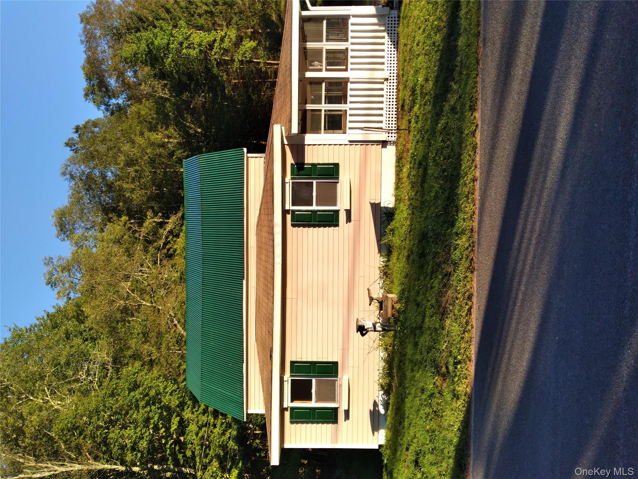 31 Willowemoc Road Livingston Manor, NY 12758 - Photo 3 of 23 a front view of a house with a garden